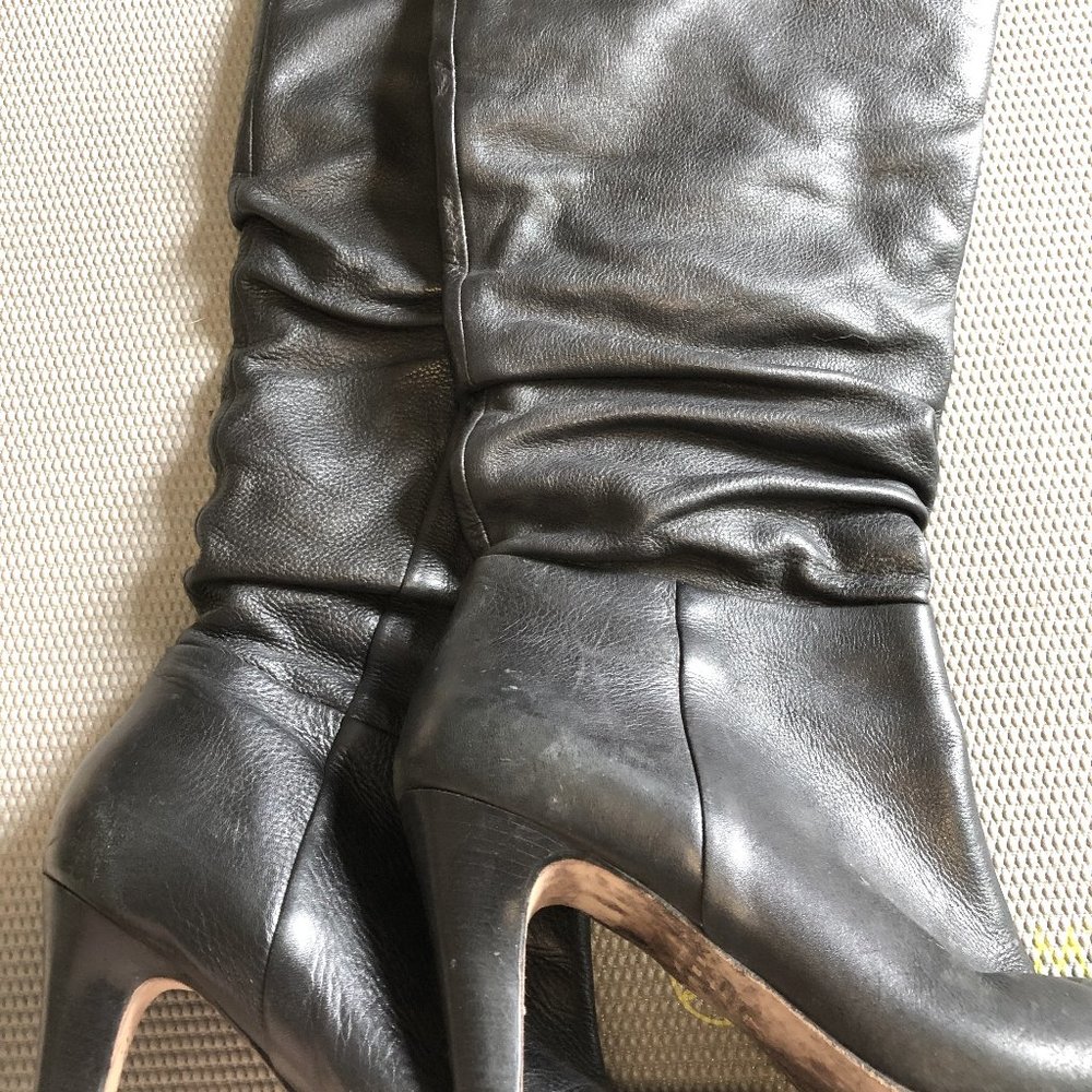Black leather heeled boots